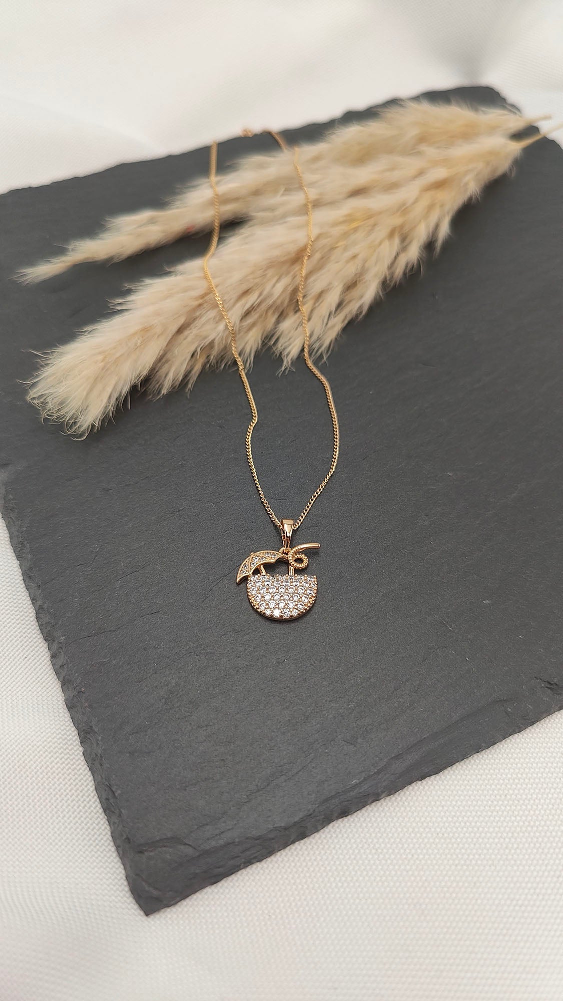 Felicity Sparkling Necklace featuring a gemstone-encrusted pendant on a sleek chain.